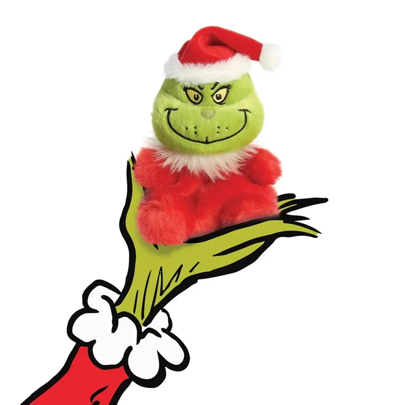 Grinch – minkštas pliušinis žaislas, sėdintis Grinčas Kalėdų Senelio aprangoje, 13 cm iš „Palm Pals“ kolekcijos, ekologiškas
